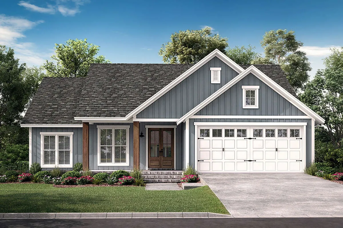 Modern gray house with stone accents and a two-car garage.