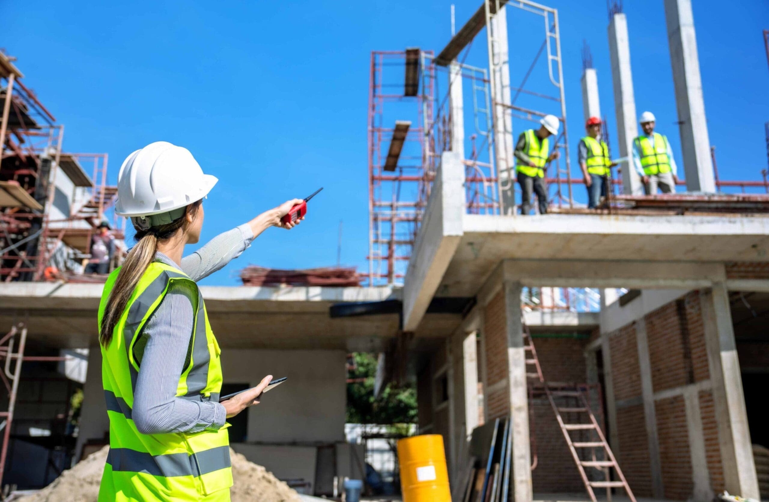 Construction workers at a building site.